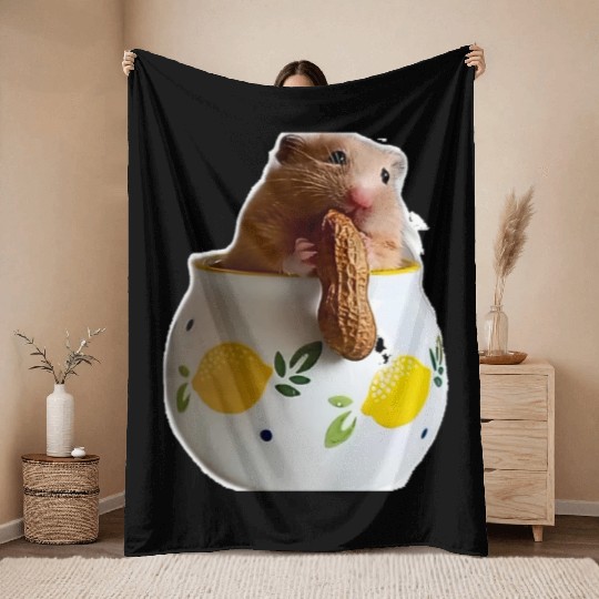 Beautiful hamster Caramella holding a peanut Throw Blankets