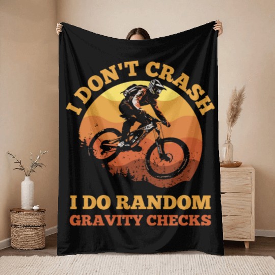 Daredevil Cyclist Throw Blankets