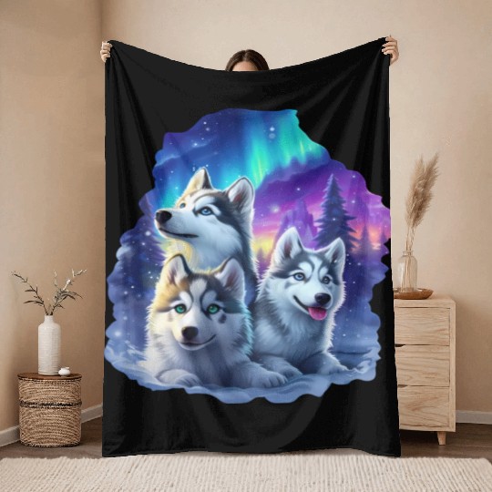 Husky family at night Throw Blankets