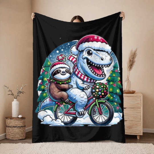 Winter Wonderland T-Rex and Sloth Cycling Duo Throw Blankets