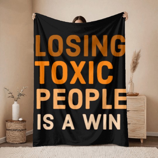 Losing toxic people is a win Throw Blankets