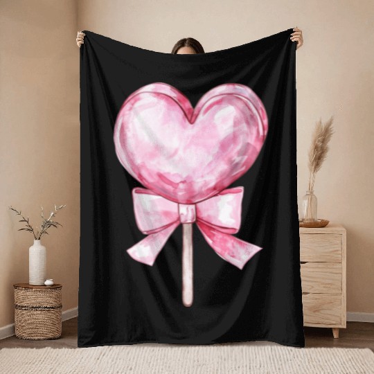 Lollipop with a pink bow Throw Blankets