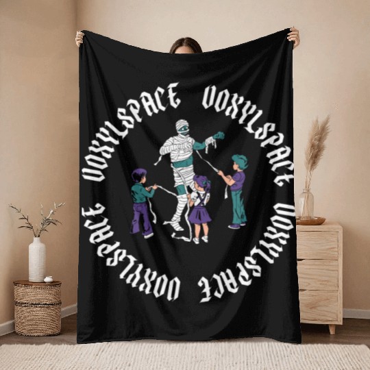 Fearsome Mummy Throw Blankets