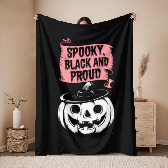 Spooky Black and Proud Throw Blankets