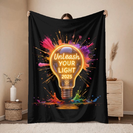 A large starburst glowing in neon light with 2025 Throw Blankets