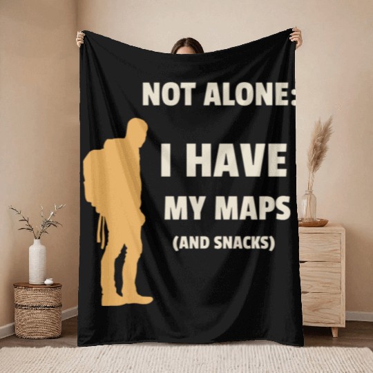Solo traveler: I have my maps and snacks Throw Blankets