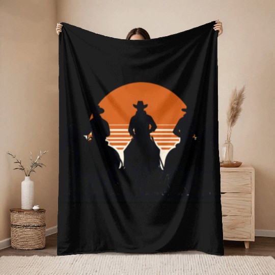 Western Riders at Sunset Throw Blankets