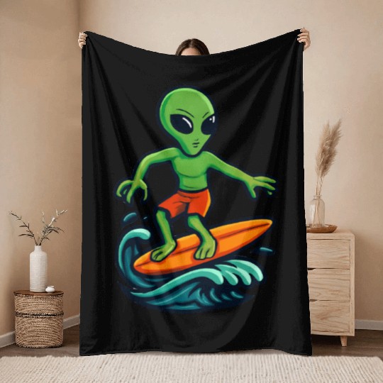 alien surfing Throw Blankets