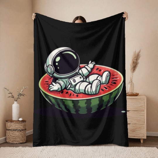 Playful Astronaut on Watermelon Slice Throw Blankets