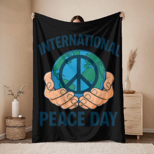 International Peace Day Hands Holding Earth Throw Blankets