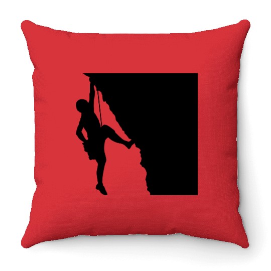 Rock climbing mountaineering silhouette Throw Pillows