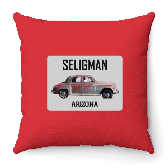 Old car city of Seligman in Arizonna, US Route 66 Throw Pillows