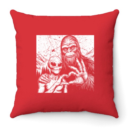 Bigfoot and alien Sasquatch love hand sign Weird S Throw Pillows