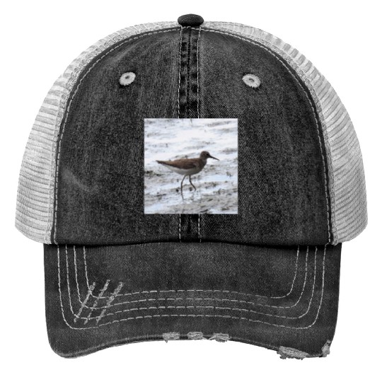 Sandpiper walking along the shore Trucker Hats