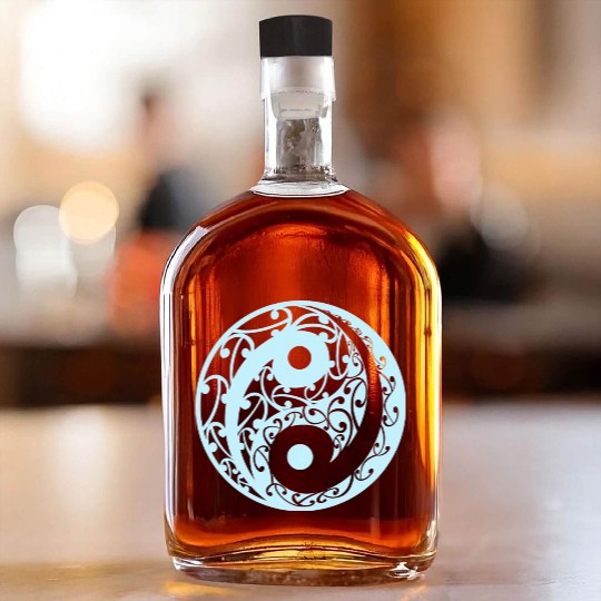 Yin And Yang In A Koru Pattern In A Light Blue Whiskey Bottles