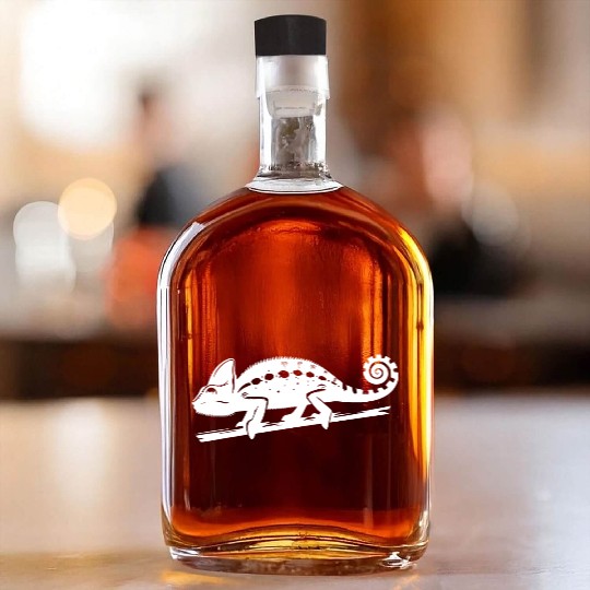 Spotted Chameleon Runs Across A Branch Whiskey Bottles