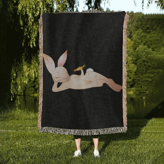 Relaxed rabbit with carrot is enjoying his life Woven Blankets