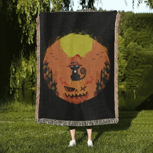 black Cat Sitting on Pumpkin Surrounded by Haunted Woven Blankets