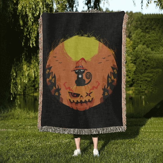black Cat Sitting on Pumpkin Surrounded by Haunted Woven Blankets