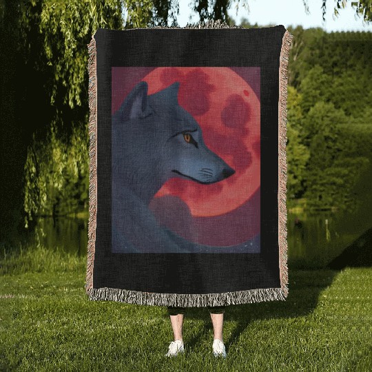 A Grey Wolf Staring at a Blood Moon Woven Blankets