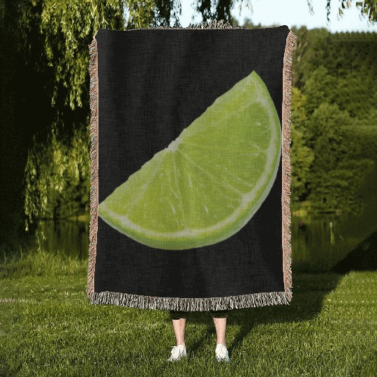 sliced green fruit Woven Blankets