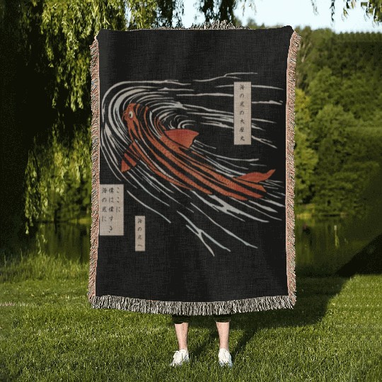 Koi fish on the seabed Woven Blankets