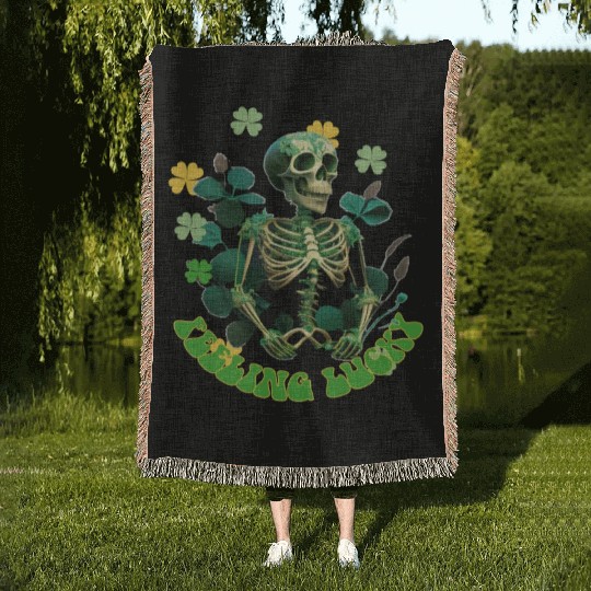 feeling lucky Woven Blankets