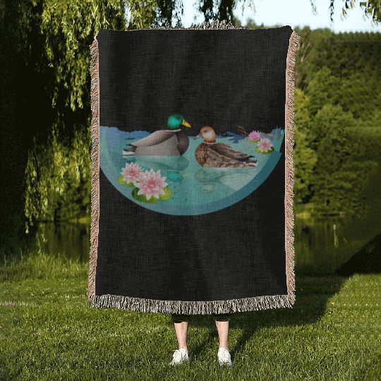 Duck couple in a duck pond with water lilies Woven Blankets