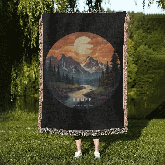 Banff sunset Woven Blankets