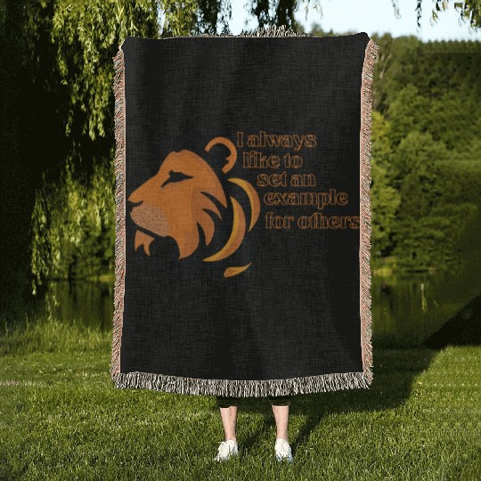 the lion is strong Woven Blankets