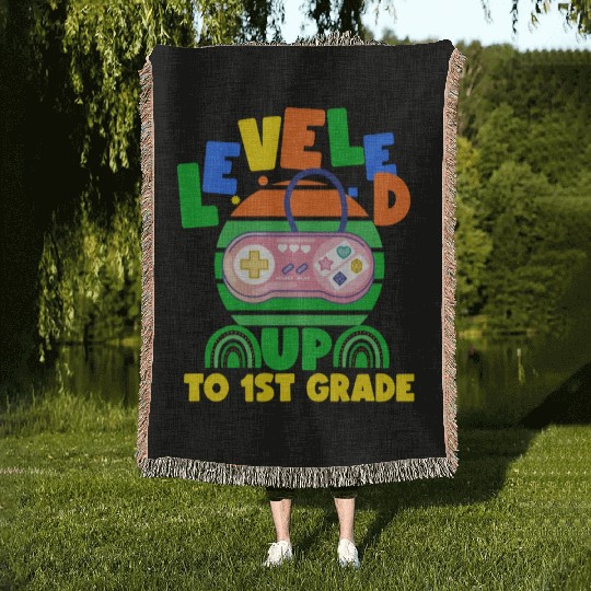 Level up to 1st grade, back to school Woven Blankets