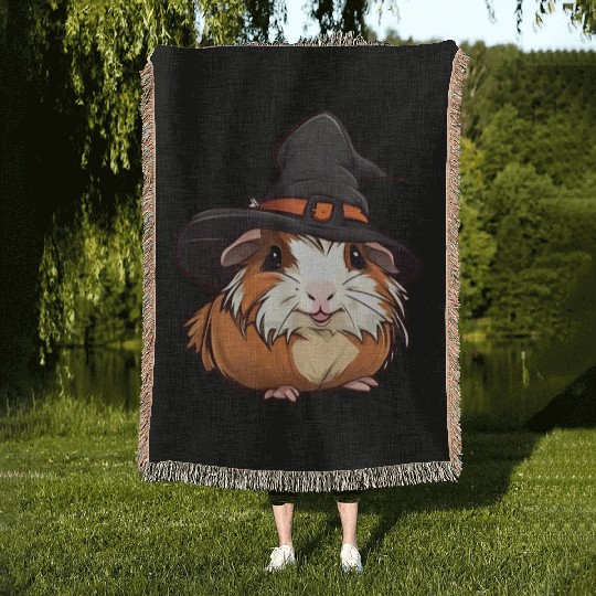 Cute Halloween guinea pig with a witch hat. Woven Blankets