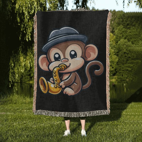 Chimpanzee with saxophone Woven Blankets