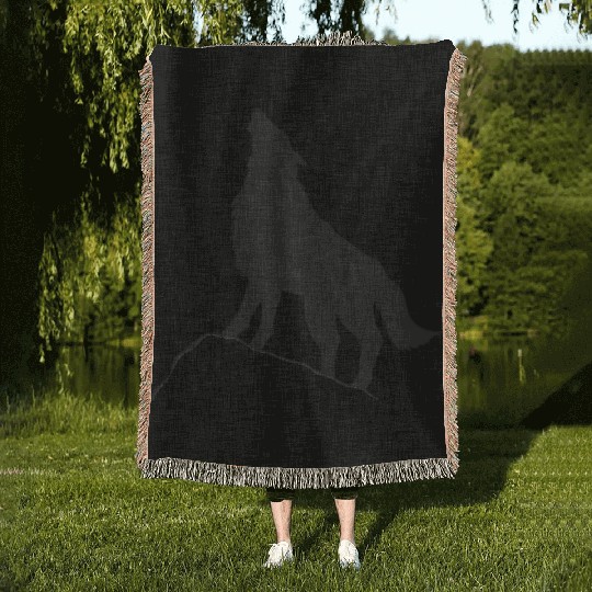 Howling Wolf Silhouette Woven Blankets