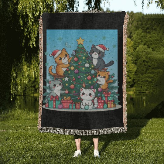 Kittens decorate a Christmas tree Woven Blankets