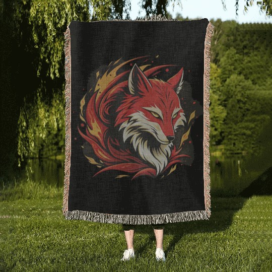 Illustration of a fox's head in red and black. Woven Blankets