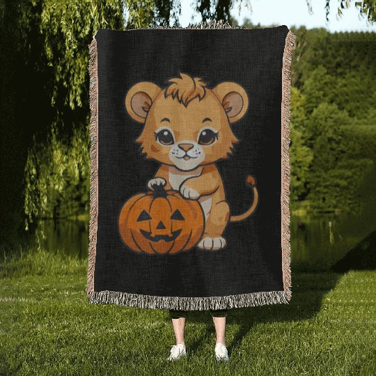 baby lion with a halloween pumpkin Woven Blankets
