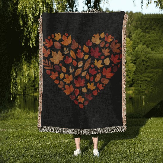 autumnal heart, made from colorful autumn leaves Woven Blankets