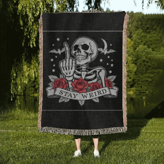 Stay weird skeleton middle finger Woven Blankets