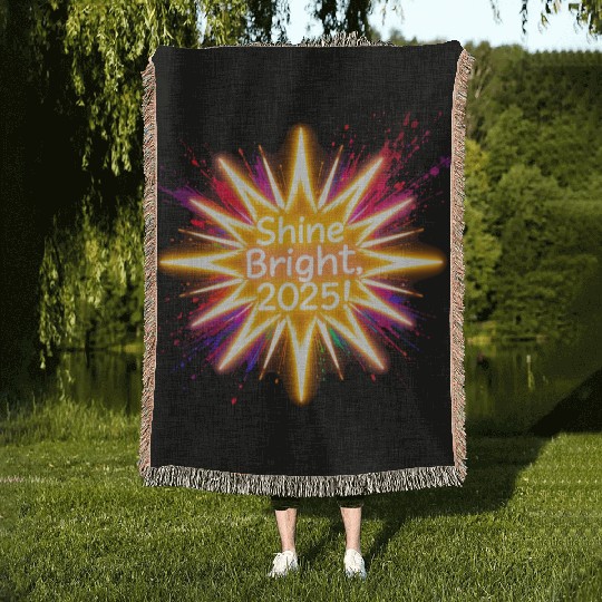 A large starburst glowing in neon light with 2025 Woven Blankets