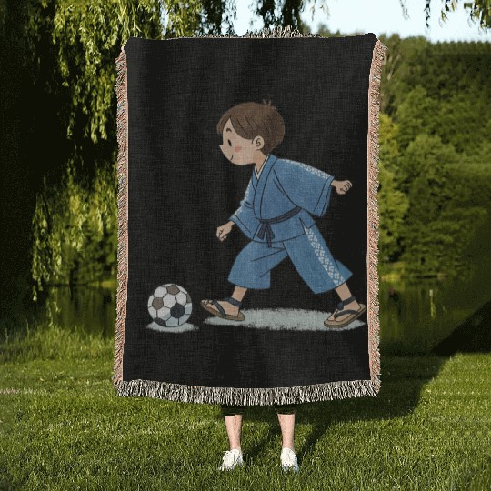 Boy in kimono playing soccer Woven Blankets