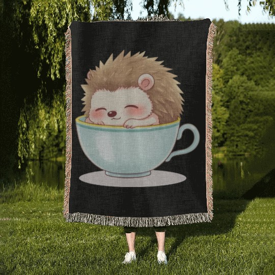 Cute hedgehog relaxing in a light blue cup Woven Blankets