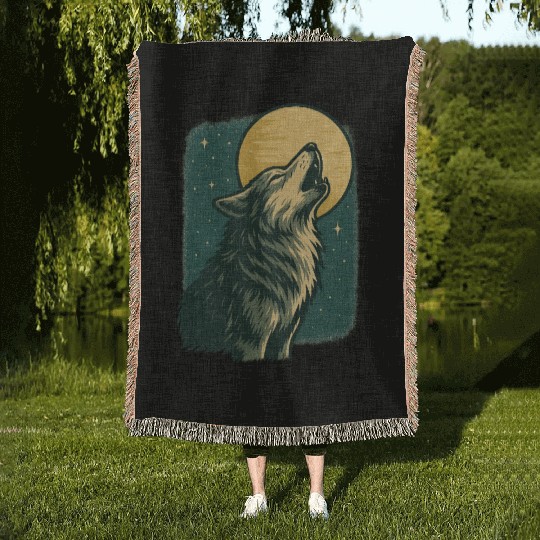 Lone wolf howl at the moon Woven Blankets