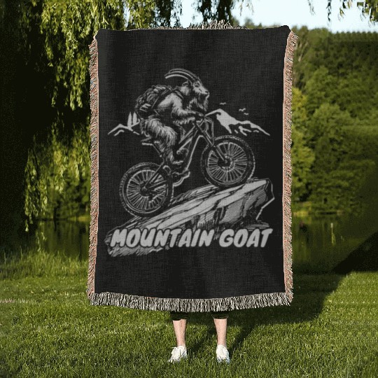 Mountain Goat on Bike Woven Blankets