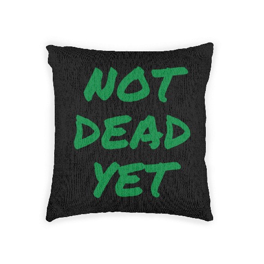 NOT DEAD YET (in green graffiti letters) Woven Pillows