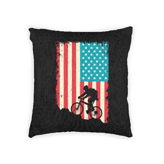 mountain biking american flag Woven Pillows
