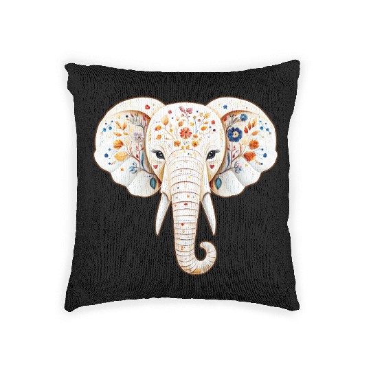A white elephant adorned with a vivid and vibrant Woven Pillows