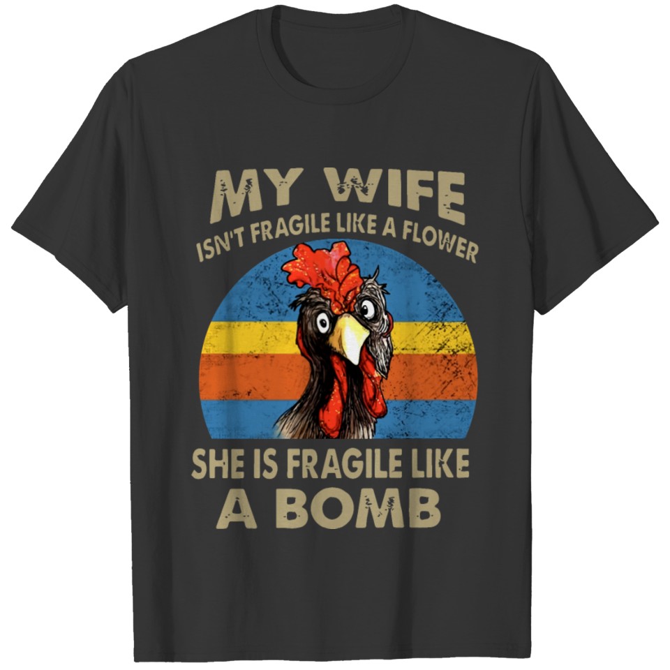 my wife is not fragile like a flower she is fragil T Shirts