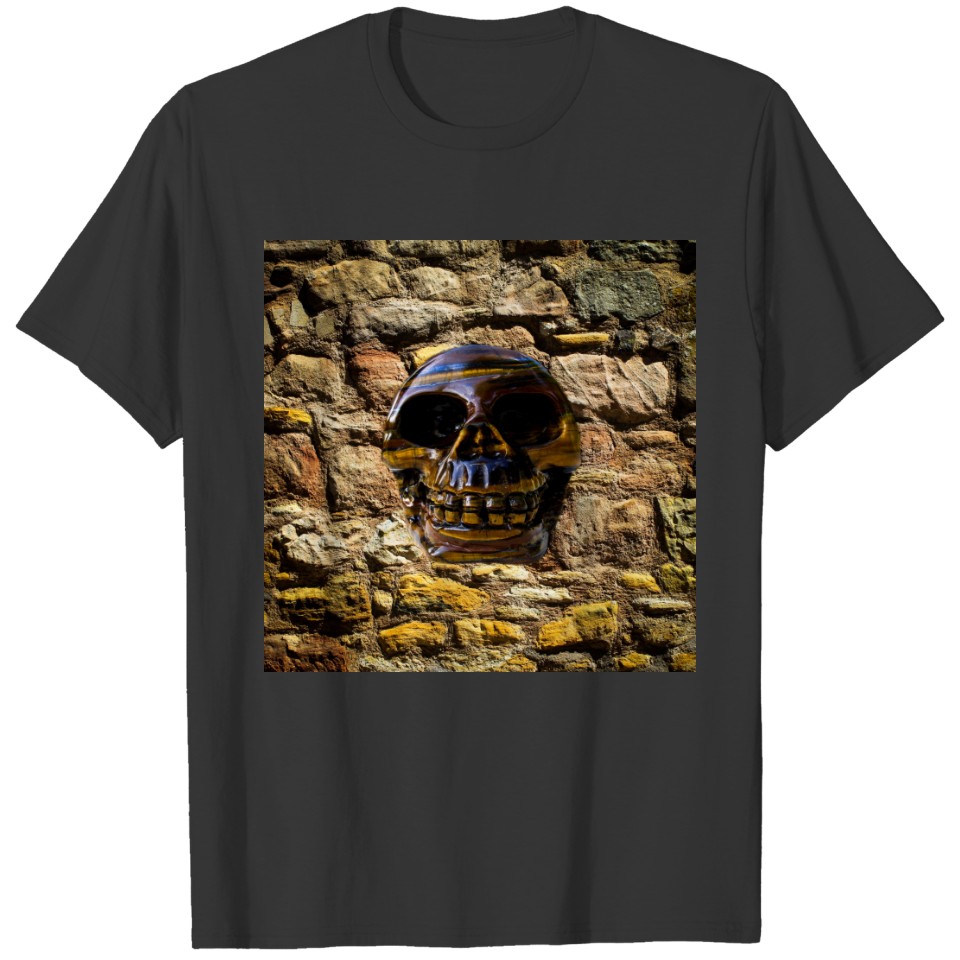 skull embedded on stone wall polo T-shirt