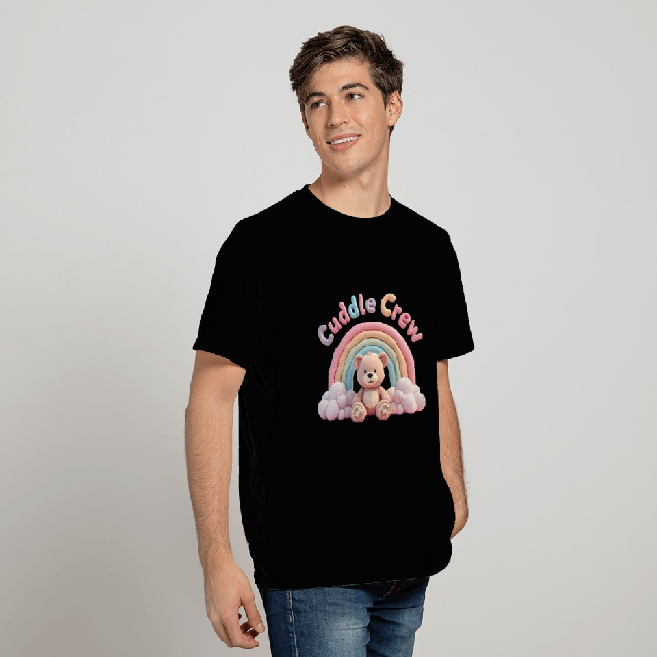 Soft teddy bear sitting under a rainbow T Shirts